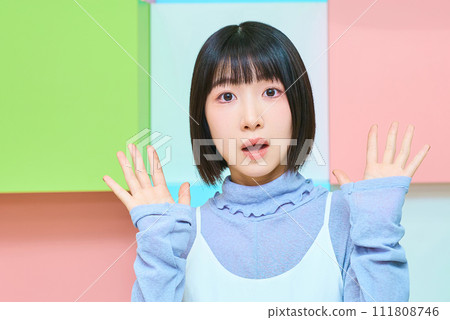 A young woman with a surprised expression A young woman with a surprised expression 111808746