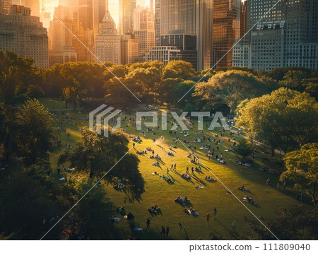 Cityscape aglow with autumnal hues under the night sky, nestled amidst parks and trees, reflecting the vibrant colors of the season 111809040