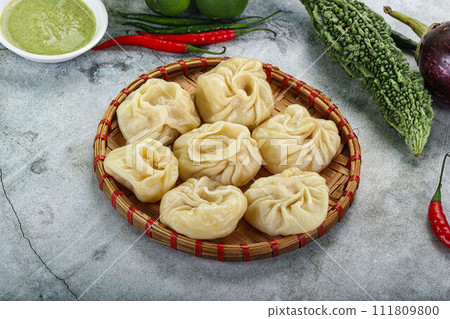 Nepali steamed dumplings Momo with sause Nepali steamed dumplings Momo with sause 111809800