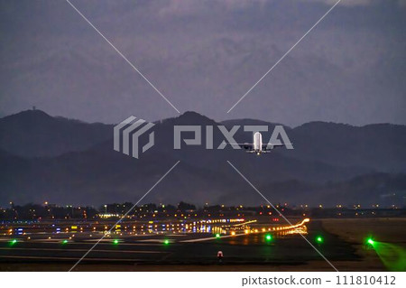 Sendai Airport at dusk, airplane taking off, Natori City, Miyagi Prefecture 111810412