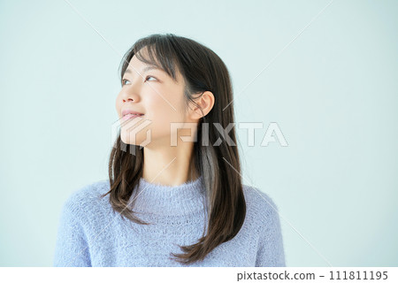 White background with smiling young woman 111811195