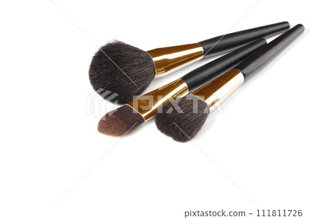 Cosmetic brushes for applying makeup. Makeup artist accessories isolated on white background.  111811726