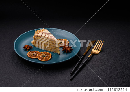 Piece of delicious sweet esterhazy cake with nuts and cream 111812214