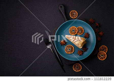 Piece of delicious sweet esterhazy cake with nuts and cream Piece of delicious sweet esterhazy cake with nuts and cream 111812220