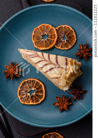 Piece of delicious sweet esterhazy cake with nuts and cream 111812225