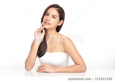 Beautiful young asian woman with clean fresh skin on white background, Face care, Facial treatment, Cosmetology, beauty and spa, Asian women portrait. Beautiful young asian woman with clean fresh skin on white background, Face care, Facial treatment, Cosmetology, beauty and spa, Asian women portrait. 111812580