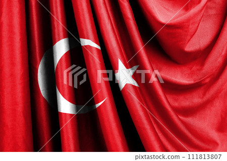 Flag of Turkey waving in the wind. Turkish national ensign. Crescent moon and the star illustration Flag of Turkey waving in the wind. Turkish national ensign. Crescent moon and the star illustration 111813807