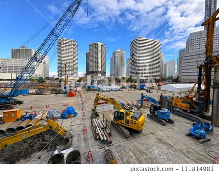Urban landscape with a large construction site Urban landscape with a large construction site 111814981