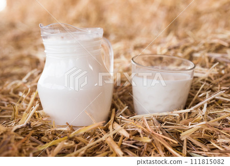 Fresh milk in a jug in the hayloft Fresh milk in a jug in the hayloft 111815082