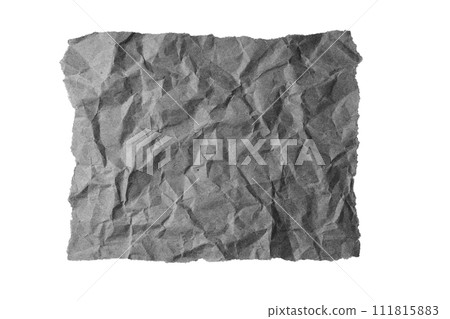 Black crumpled sheet of paper with torn edge isolated on white background. Black crumpled sheet of paper with torn edge isolated on white background. 111815883