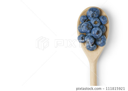 Fresh blueberries in wooden spoon isolated on white background with copy space 111815921