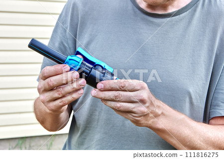 Plumber connected section of HDPE pipe to compression valve fitting with threaded connection. Plumber connected section of HDPE pipe to compression valve fitting with threaded connection. 111816275