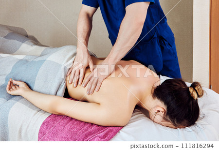 Deep tissue massage is technique that targets deep layers of muscles and connective tissue to relieve chronic pain, increase range of motion, and reduce muscle tension. 111816294
