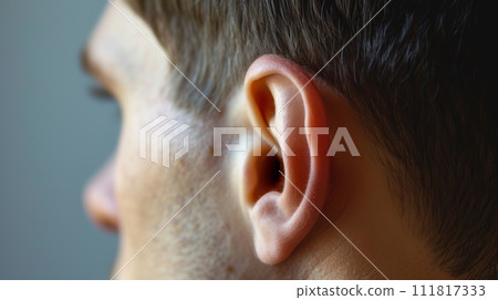 Men's ear. Close-up of a man's ear. 111817333
