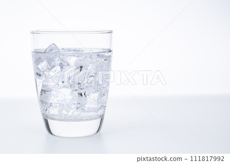Carbonated water poured into the glass 111817992