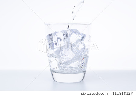Carbonated water poured into the glass Carbonated water poured into the glass 111818127