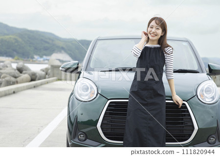 Cute woman traveling by car 111820944