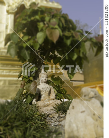 Buddha in the summer garden Buddha in the summer garden 111821200