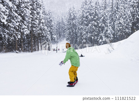Kids enjoying snowboarding Kids enjoying snowboarding 111821522