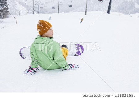 Kids enjoying snowboarding Kids enjoying snowboarding 111821683