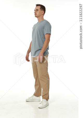 handsome young calm man on white background 111822297