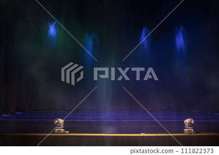 Empty retro wall background with blue rays of light and smoke. 111822373