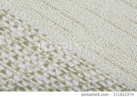 A piece of paper wallpaper with a matting or burlap pattern. Texture background of gray matting. A piece of paper wallpaper with a matting or burlap pattern. Texture background of gray matting. 111822374