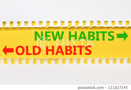 New or old habits symbol. Concept word New habits Old habits on beautiful yellow paper. Beautiful white paper background. Business new or old habits concept. Copy space. 111827145