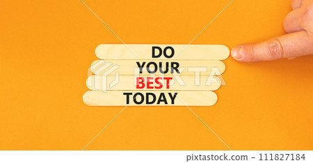 Do your best today symbol. Concept words Do your best today on wooden stick. Beautiful orange table orange background. Businessman hand. Business motivational do your best today concept. Copy space. Do your best today symbol. Concept words Do your best today on wooden stick. Beautiful orange table orange background. Businessman hand. Business motivational do your best today concept. Copy space. 111827184