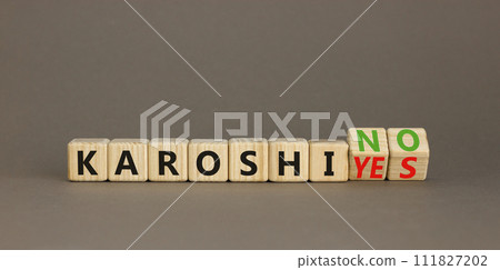Karoshi yes or no symbol. Concept words Karoshi Yes or No on beautiful wooden blocks. Beautiful grey table grey background. Business and stop karoshi concept. Copy space. Karoshi yes or no symbol. Concept words Karoshi Yes or No on beautiful wooden blocks. Beautiful grey table grey background. Business and stop karoshi concept. Copy space. 111827202