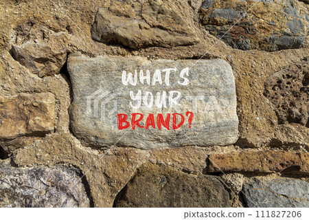 Branding and what is your brand symbol. Concept words What is your brand on beautiful big grey stone. Beautiful stone wall background. Business branding what is your brand concept. Copy space 111827206