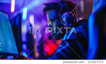 eSports competitive gamer in the heat of intense gameplay 111827372