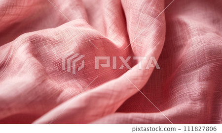 the tactile charm of a colored fabric textures, with a focus on neatly folded linen 111827806