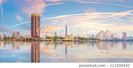 Cairo downtown panorama, pyramids, nile and the skyscrappers, Egypt Cairo downtown panorama, pyramids, nile and the skyscrappers, Egypt 111830482
