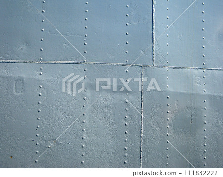 Detailed gray metal historic ship wall with seams and rivets Detailed gray metal historic ship wall with seams and rivets 111832222