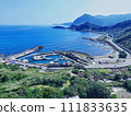 Aerial view of the coastal highway and fishing ports in the northeast corner of Taiwan. 111833635