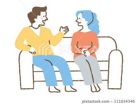 A man and a woman sitting on a sofa at home and talking_color 111834346