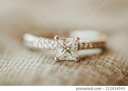AI-generated content. Princess Cut diamond engagement ring with sparkling gemstone. Central stone with small diamonds AI-generated content. Princess Cut diamond engagement ring with sparkling gemstone. Central stone with small diamonds 111834543