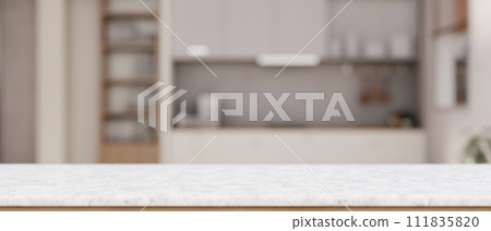 Empty space on a white tabletop with a blurred background of a contemporary kitchen. 111835820