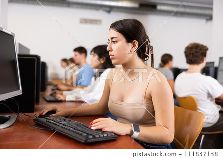 Teenager girl using PC during computer science lesson Teenager girl using PC during computer science lesson 111837138