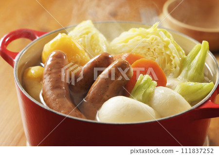 Warm pot-au-feu with plenty of ingredients Warm pot-au-feu with plenty of ingredients 111837252