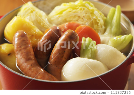 Warm pot-au-feu with plenty of ingredients 111837255
