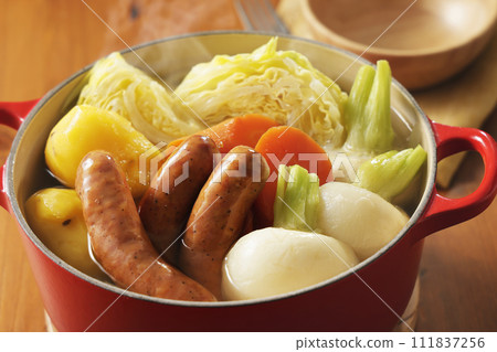 Warm pot-au-feu with plenty of ingredients Warm pot-au-feu with plenty of ingredients 111837256