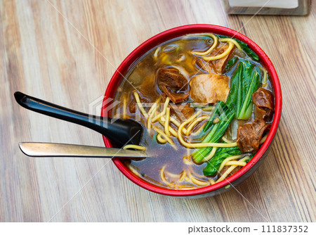 Beef soup with noodles 111837352