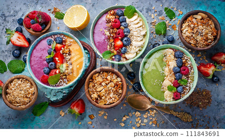 colorful smoothie bowls and granola 111843691