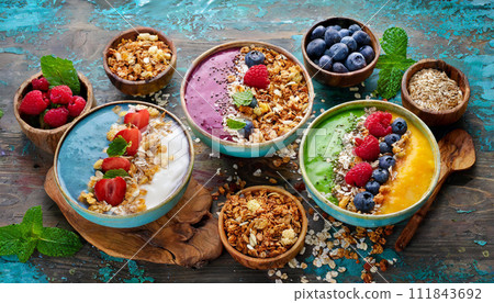 colorful smoothie bowls and granola 111843692