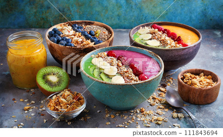 colorful smoothie bowls and granola colorful smoothie bowls and granola 111843694
