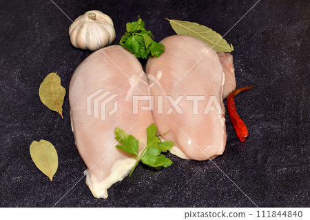 Chicken breasts ready to cook. 111844840