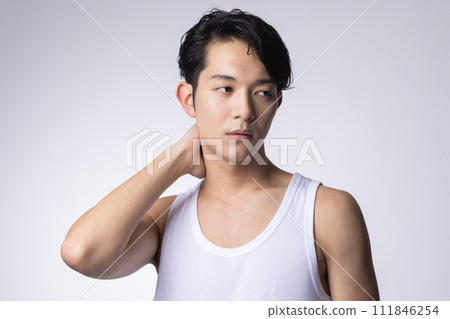 Upper body close-up portrait of a young man with white background 111846254
