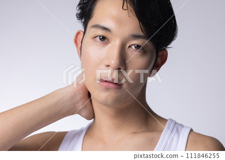 Upper body close-up portrait of a young man with white background Upper body close-up portrait of a young man with white background 111846255